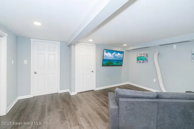 a view of livingroom with wooden floor