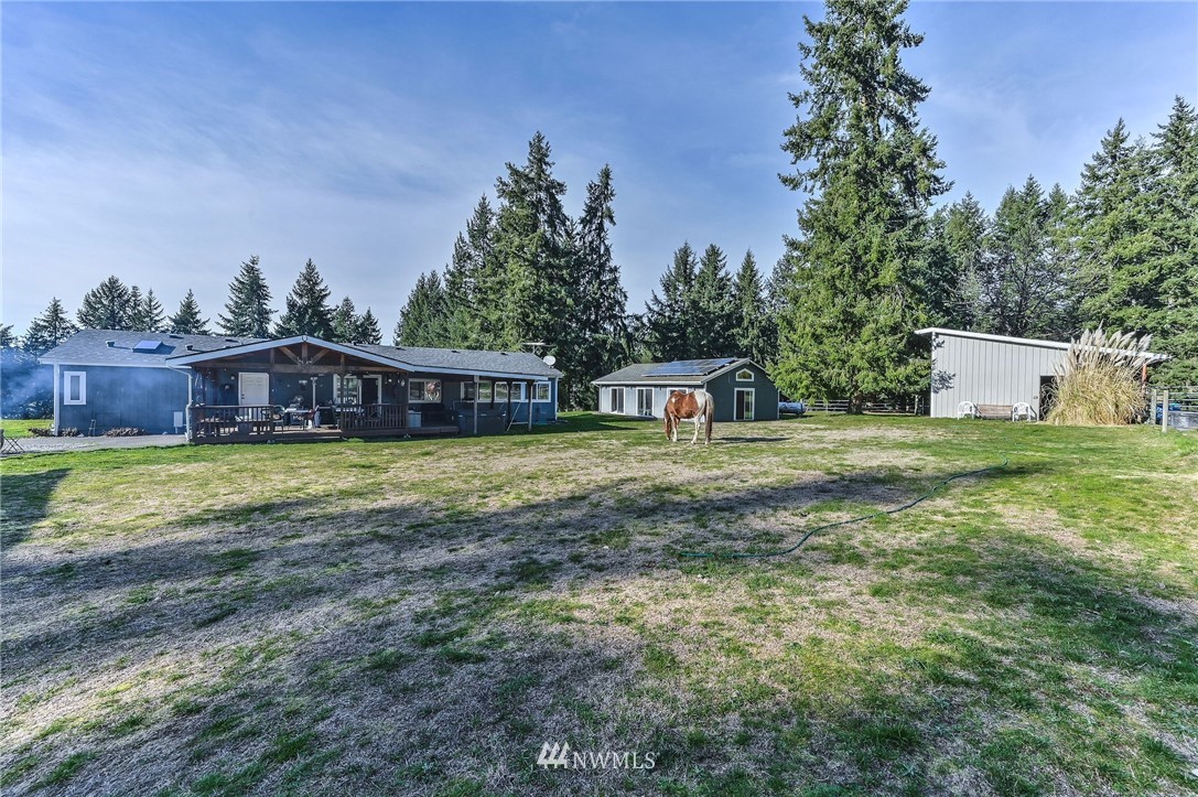 36027 Allen Road South Roy, WA 98580 - Photo 9 of 33 a view of a house with a yard
