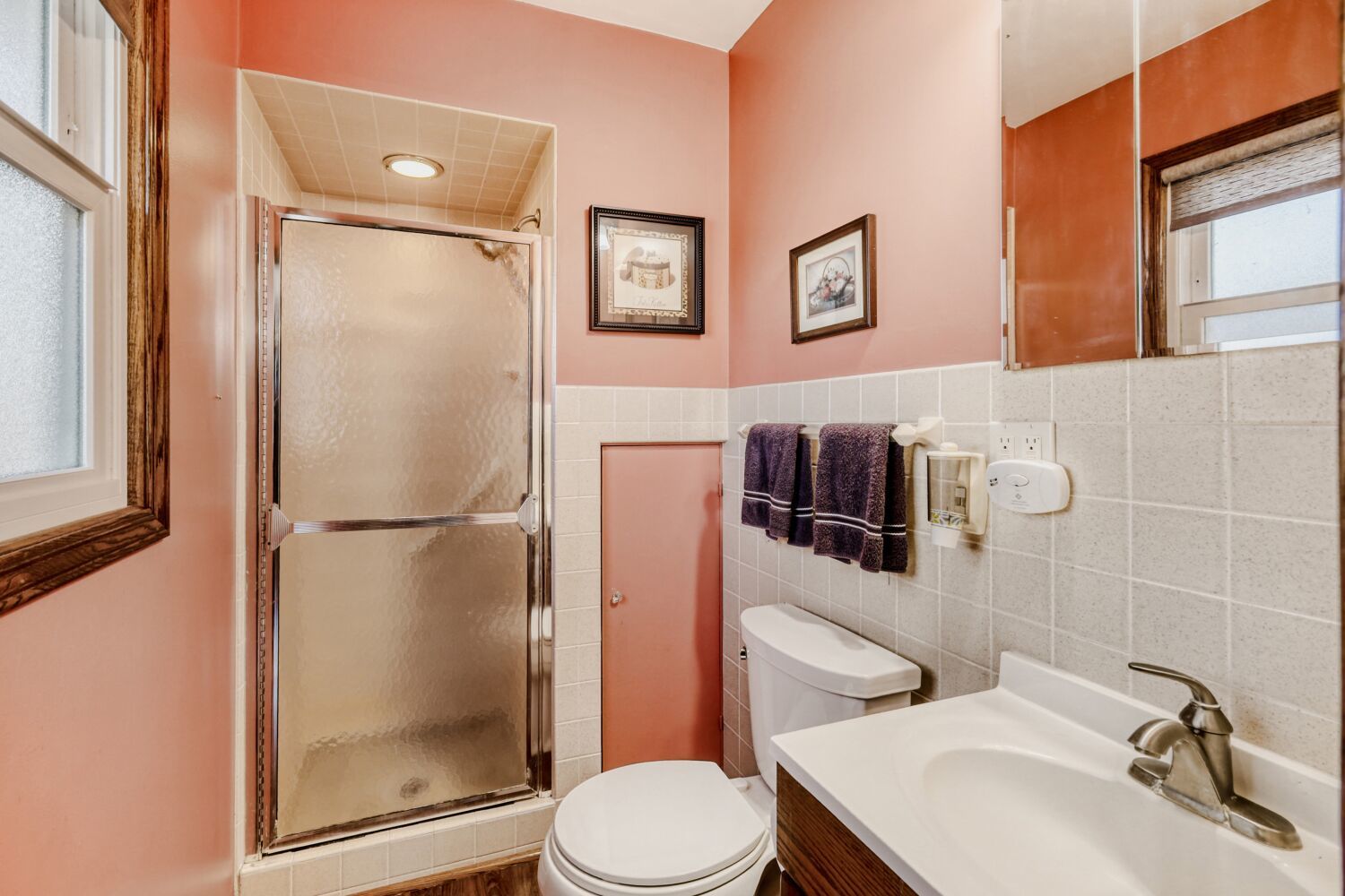 340 West Middle Street South Elgin, IL 60177 - Photo 13 of 28 a white toilet sitting next to a bathroom sink