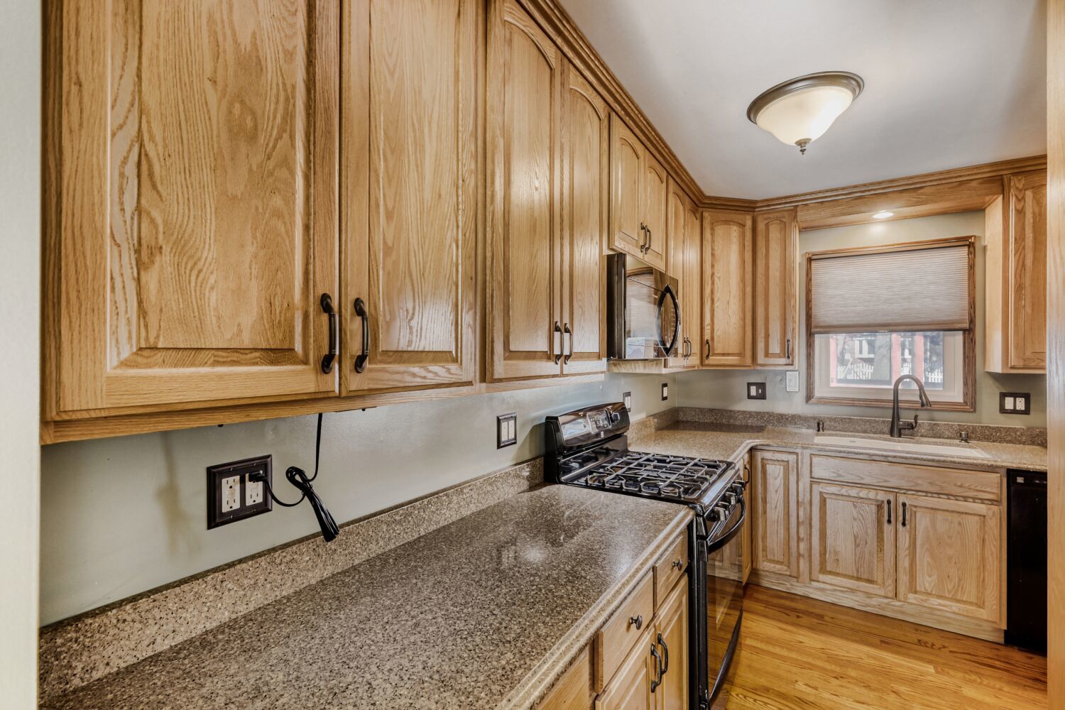 340 West Middle Street South Elgin, IL 60177 - Photo 7 of 28 a kitchen with stainless steel appliances granite countertop a sink and a stove