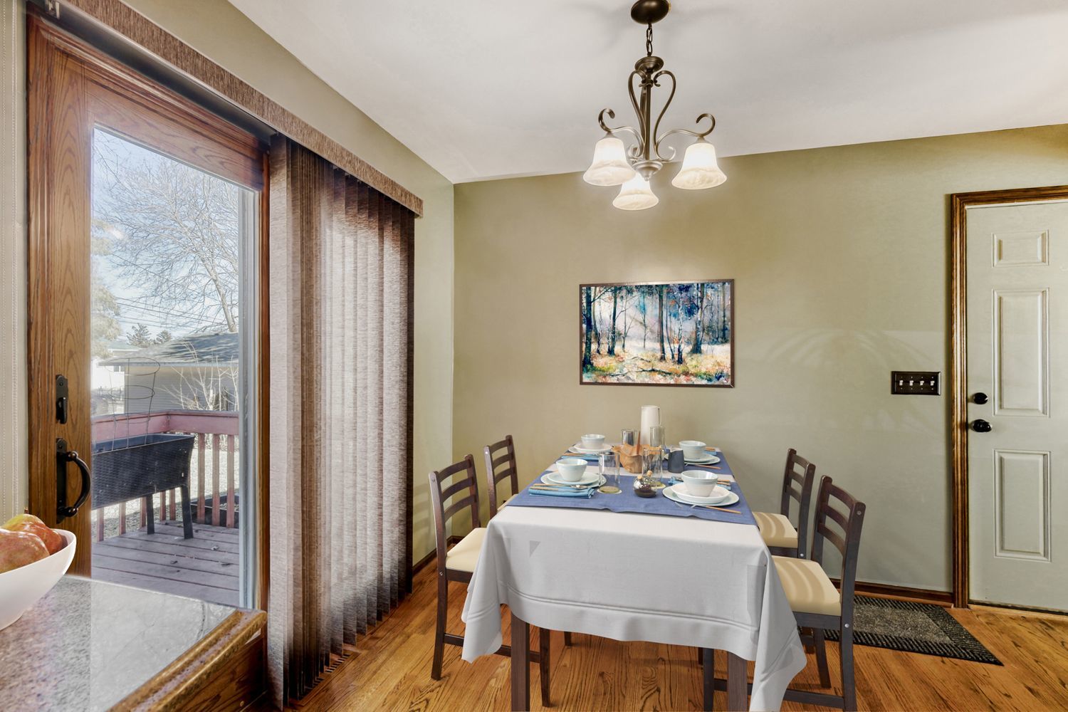 340 West Middle Street South Elgin, IL 60177 - Photo 9 of 28 a dining room with wooden floor and a chandelier