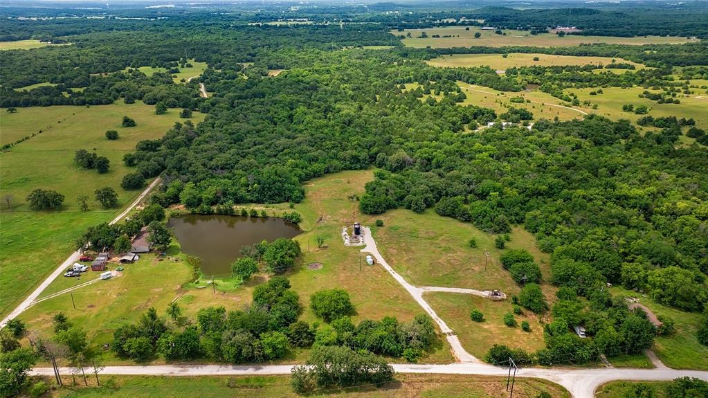 178 County Road 178 Gainesville, TX 76240 - Photo 7 of 7 a view of a lake with a yard