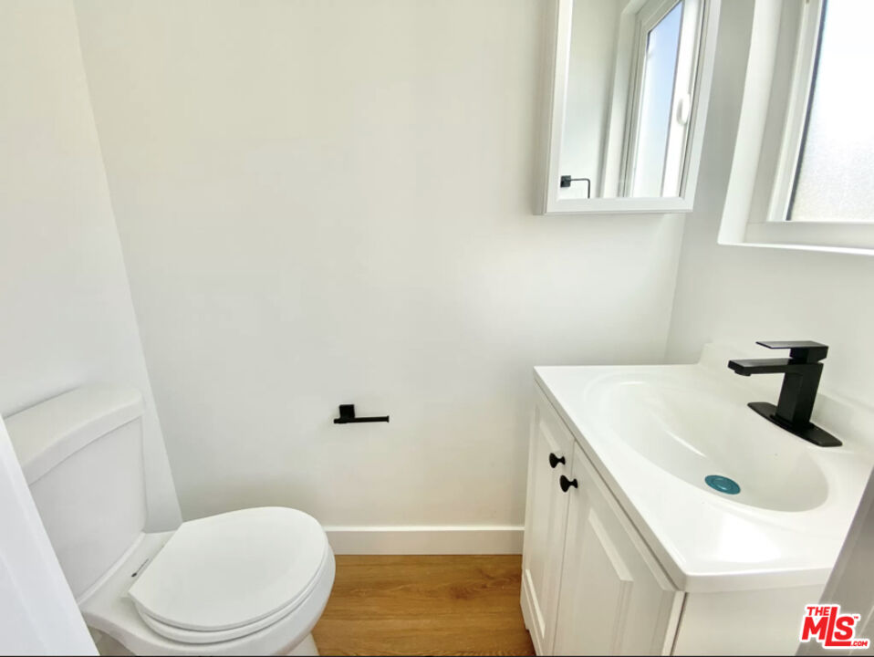 3824 Keystone Avenue, Unit 2 Culver City, CA 90232 - Photo 9 of 10 a bathroom with a sink and a toilet