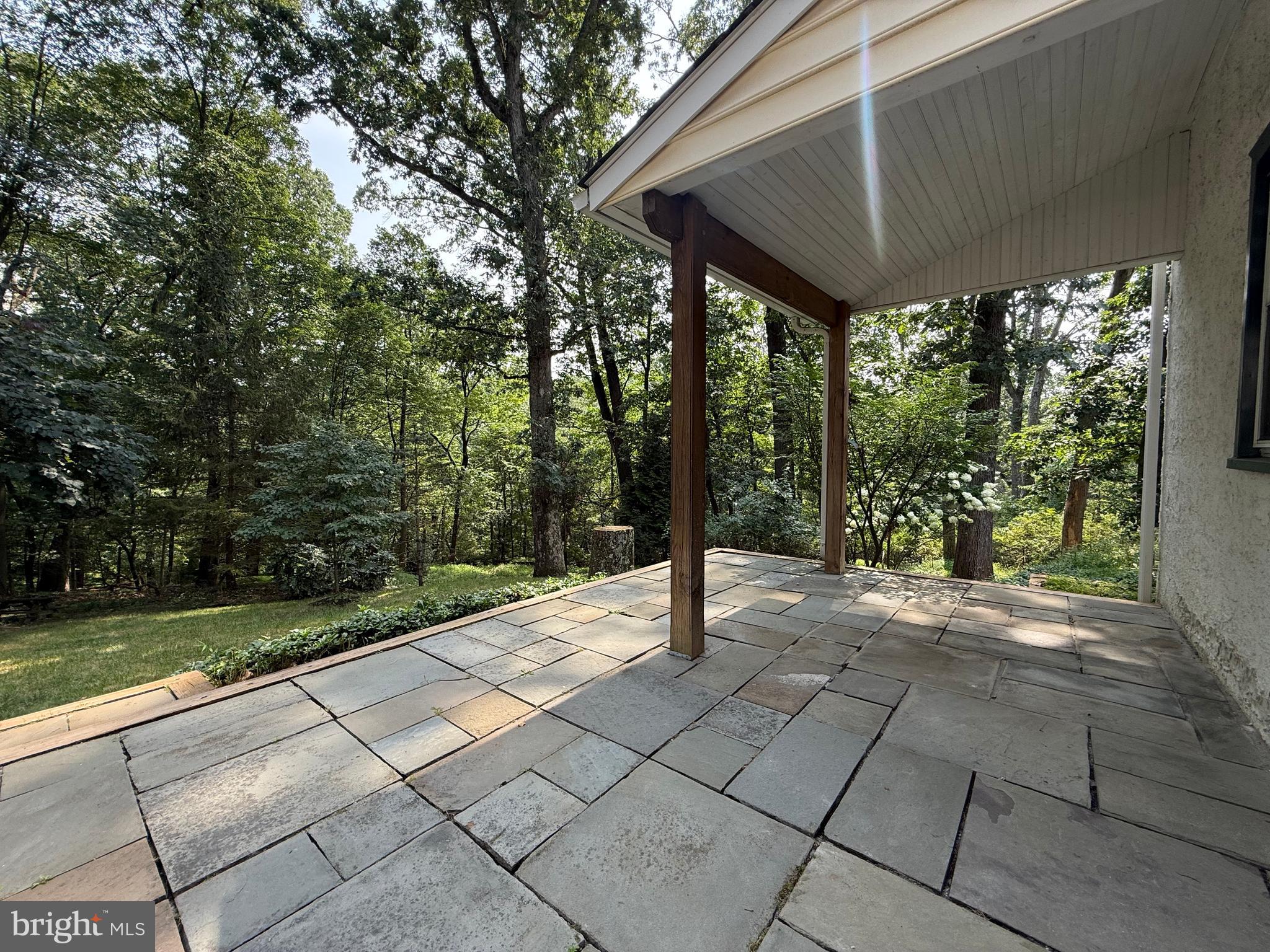 325 Greene Road Berwyn, PA 19312 - Photo 9 of 50 a view of a backyard with pathway
