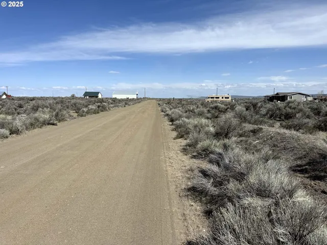 an aerial view of beach and city