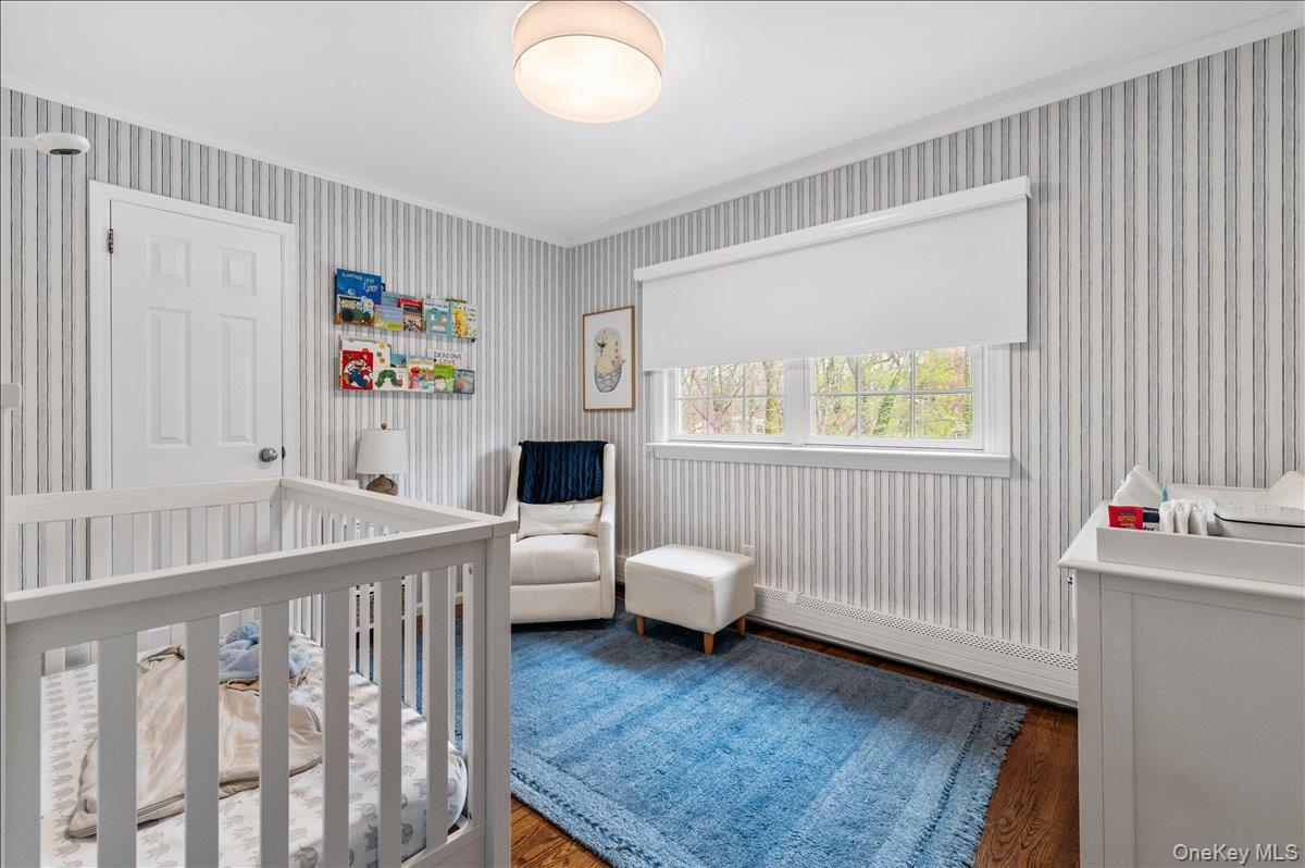 8 Heritage Court Cold Spring Harbor, NY 11724 - Photo 21 of 38 a bedroom with furniture and a window