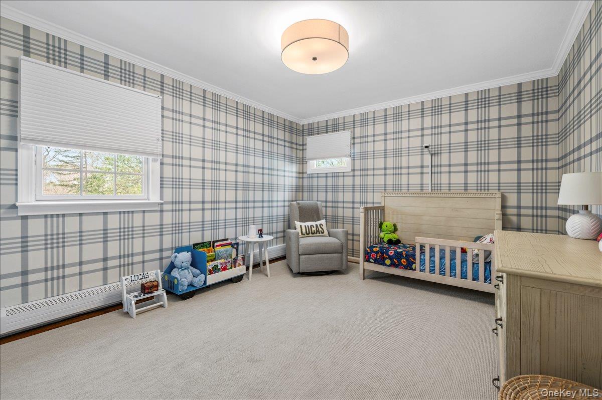 8 Heritage Court Cold Spring Harbor, NY 11724 - Photo 22 of 38 a view of livingroom with furniture and windows