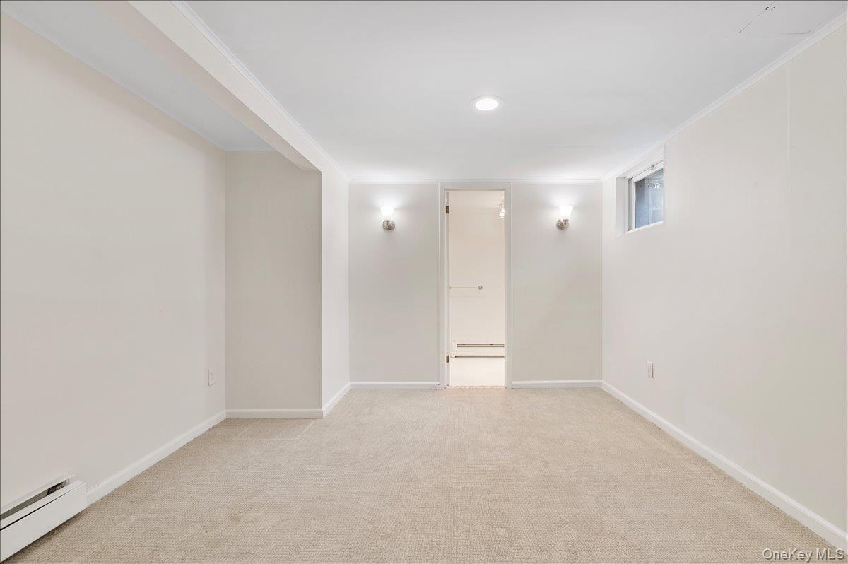 8 Heritage Court Cold Spring Harbor, NY 11724 - Photo 27 of 38 a view of an empty room