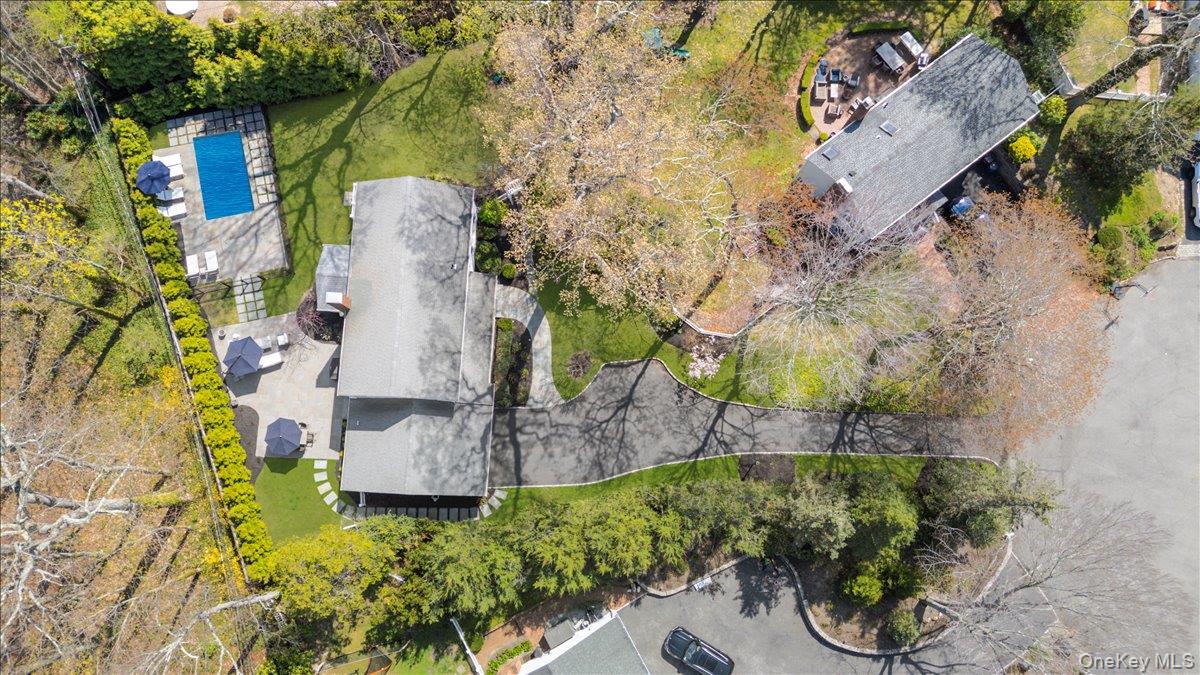 8 Heritage Court Cold Spring Harbor, NY 11724 - Photo 38 of 38 an aerial view of a house with a yard