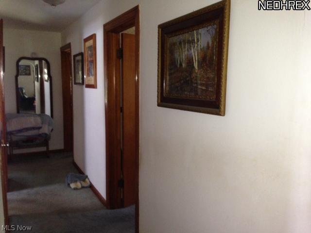 6578 Grove Road Clinton, OH 44216 - Photo 7 of 10 Nice wide hallway accessing bedrooms and bath.