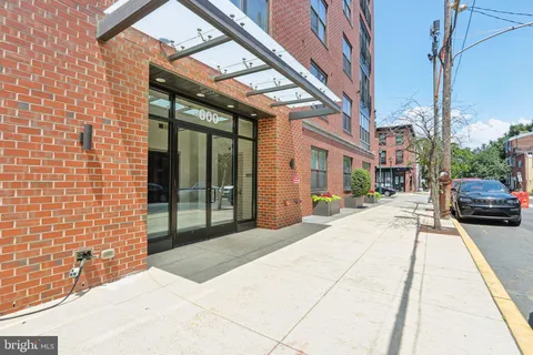 a view of a building with a street
