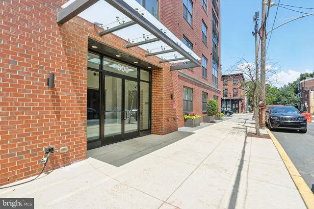 a view of a building with a street