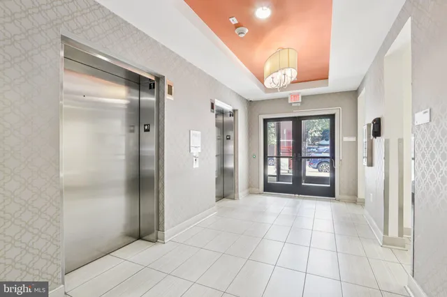 a view of an empty room with a bathroom