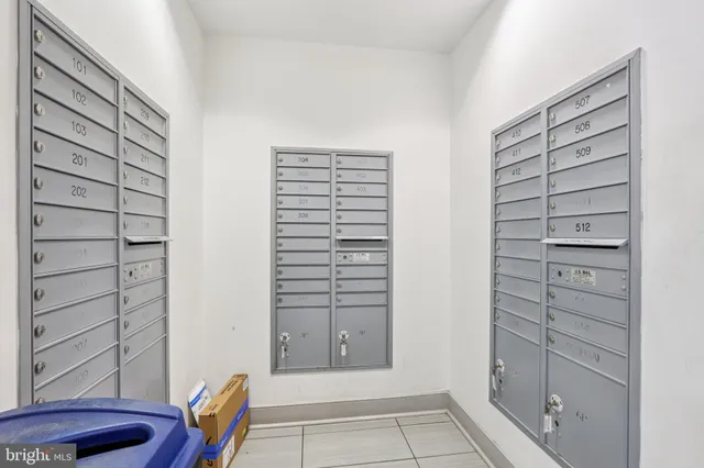 a view of walk in closet and bedroom