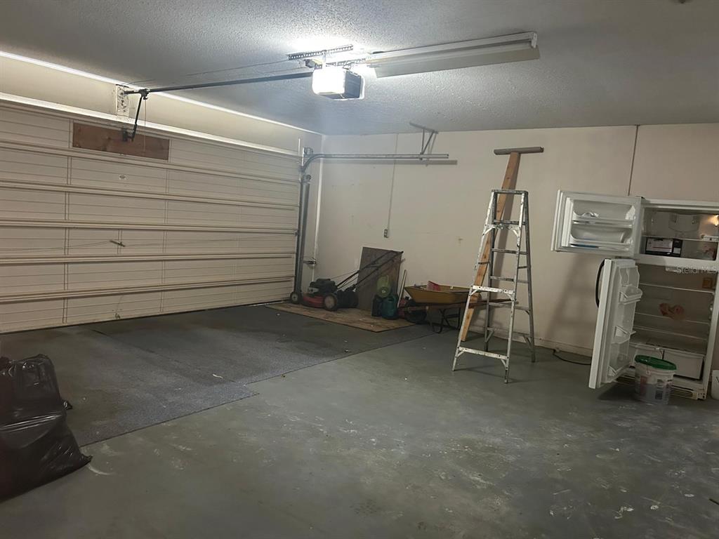 568 Silver Course Loop Ocala, FL 34472 - Photo 20 of 26 a view of a room with gym equipment