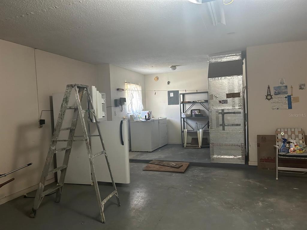 568 Silver Course Loop Ocala, FL 34472 - Photo 21 of 26 a view of a room with gym equipment