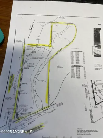 a swimming pool with outdoor seating and yard