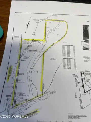 a swimming pool with outdoor seating and yard