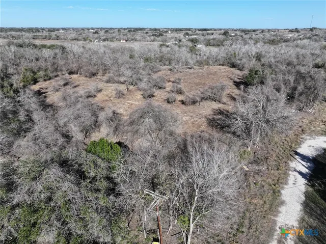 a view of outdoor space and covered with trees