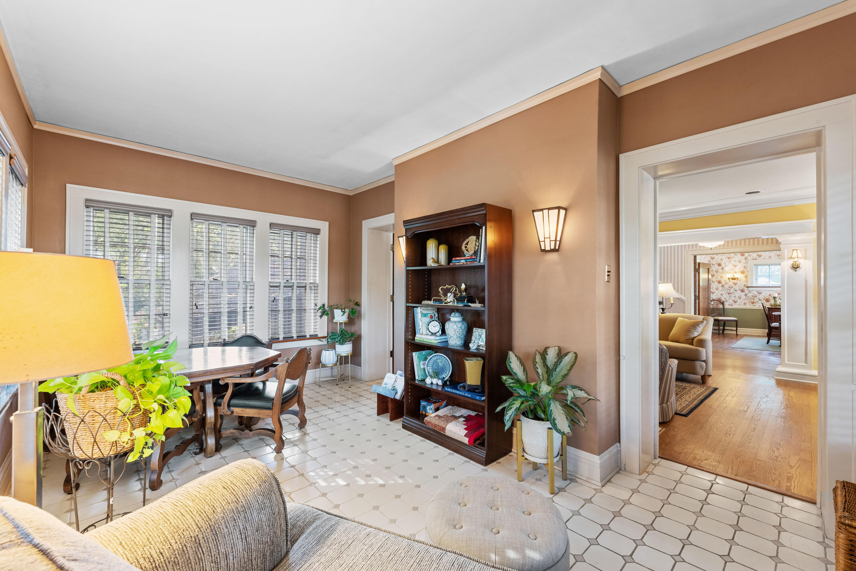 1908 Ridge Road Munster, IN 46321 - Photo 11 of 39 a living room with furniture and a potted plant