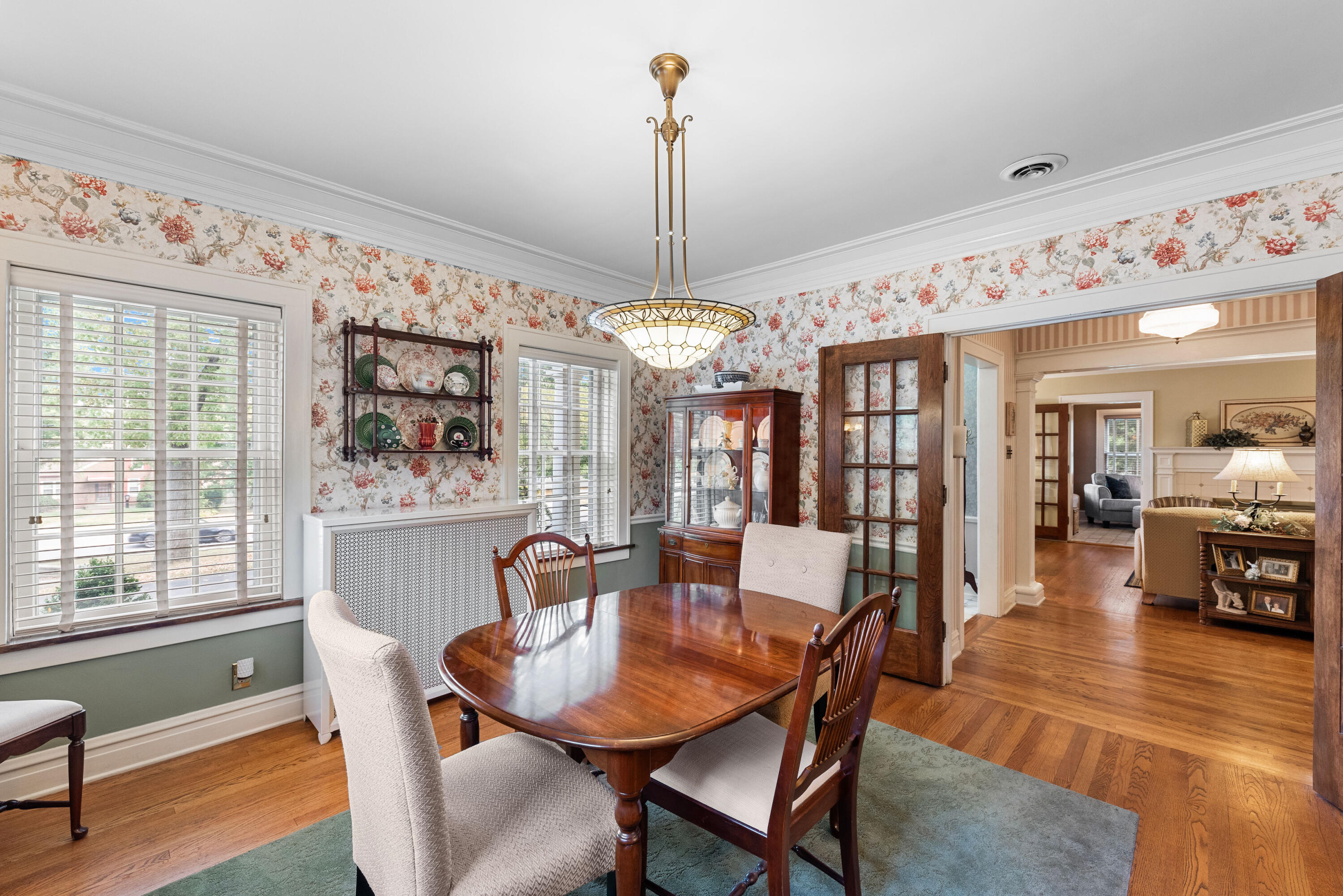 1908 Ridge Road Munster, IN 46321 - Photo 13 of 39 a view of a dining room with furniture window and wooden floor