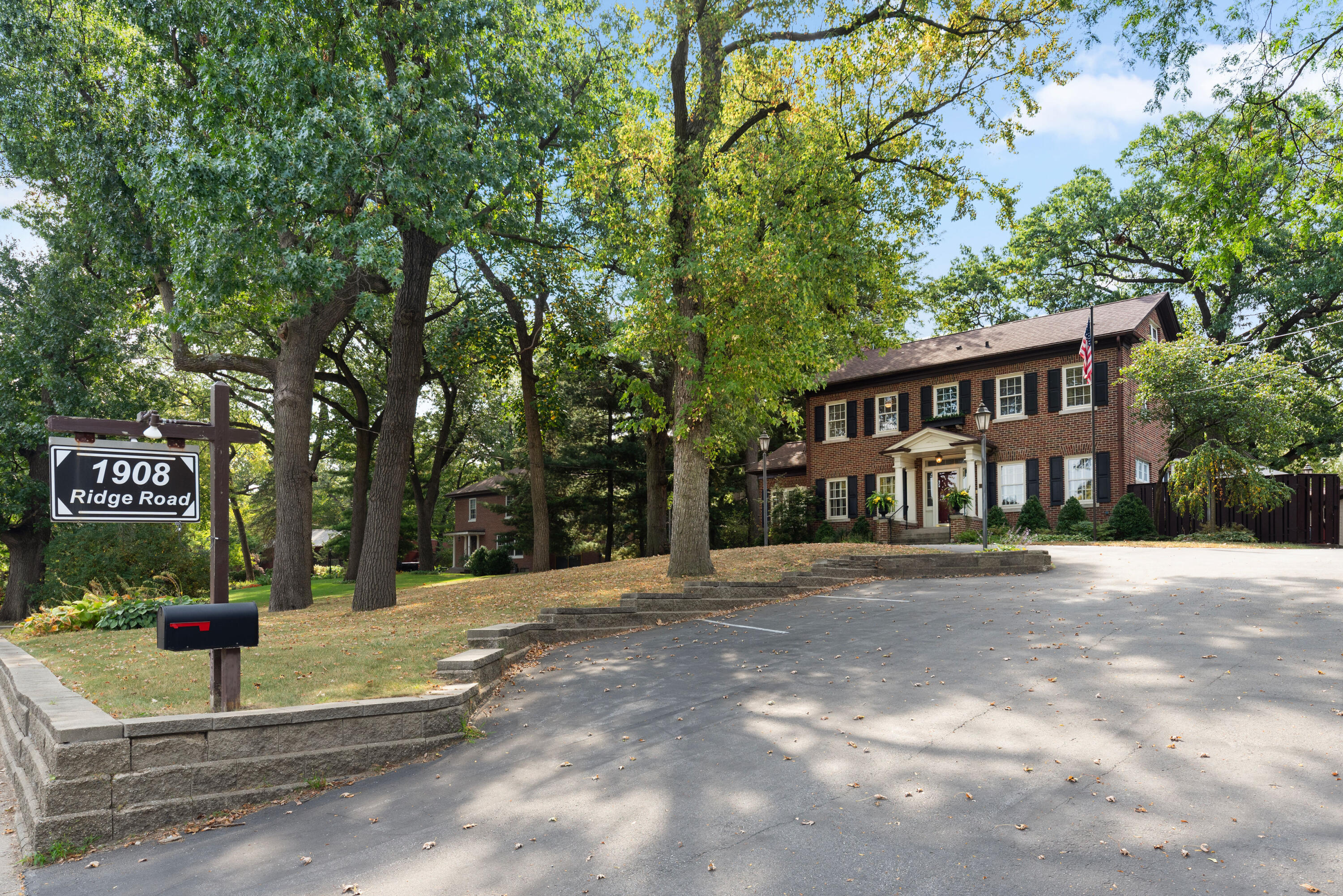 1908 Ridge Road Munster, IN 46321 - Photo 2 of 39 a front view of a house with a yard
