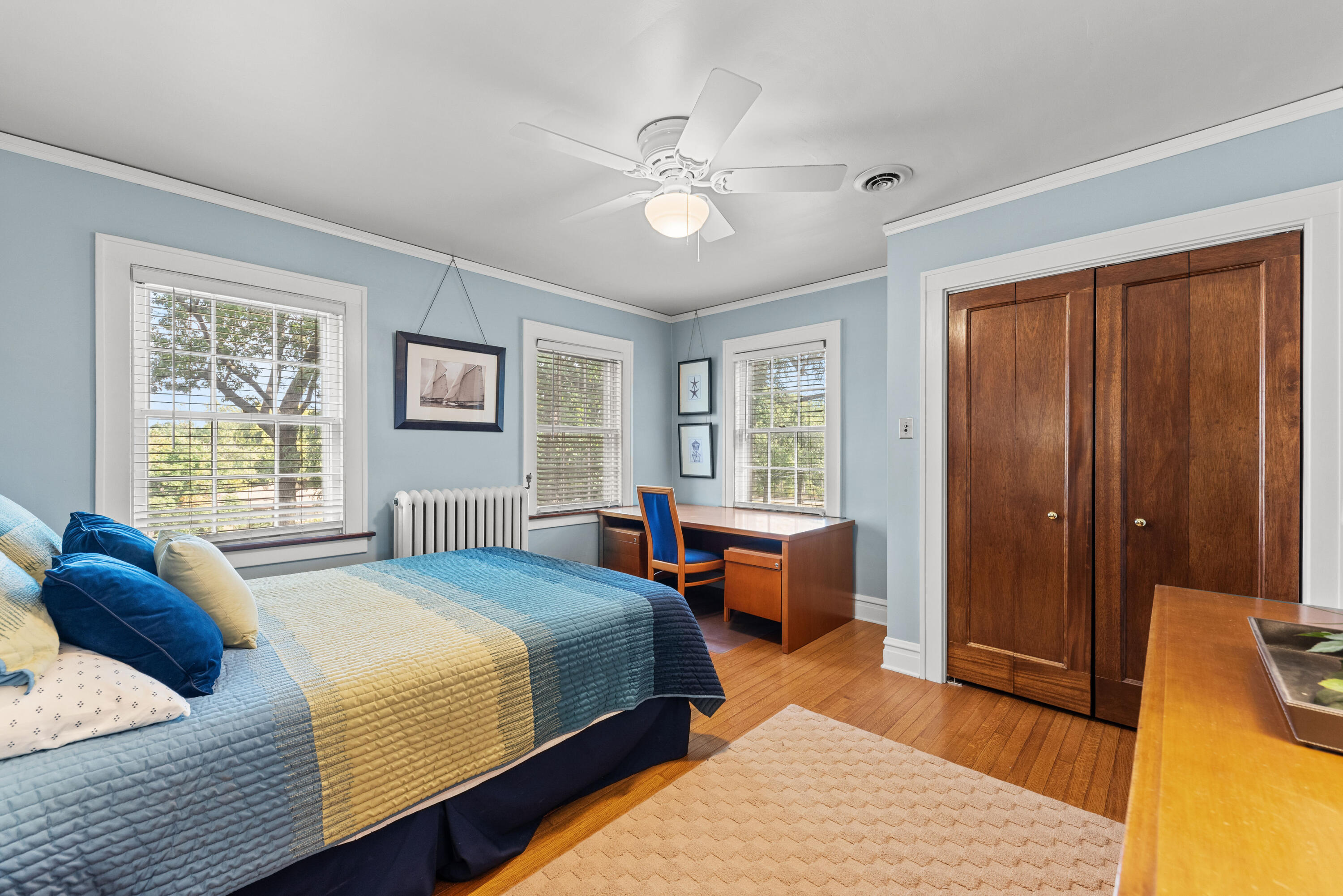 1908 Ridge Road Munster, IN 46321 - Photo 22 of 39 a bedroom with a large bed couch and two windows