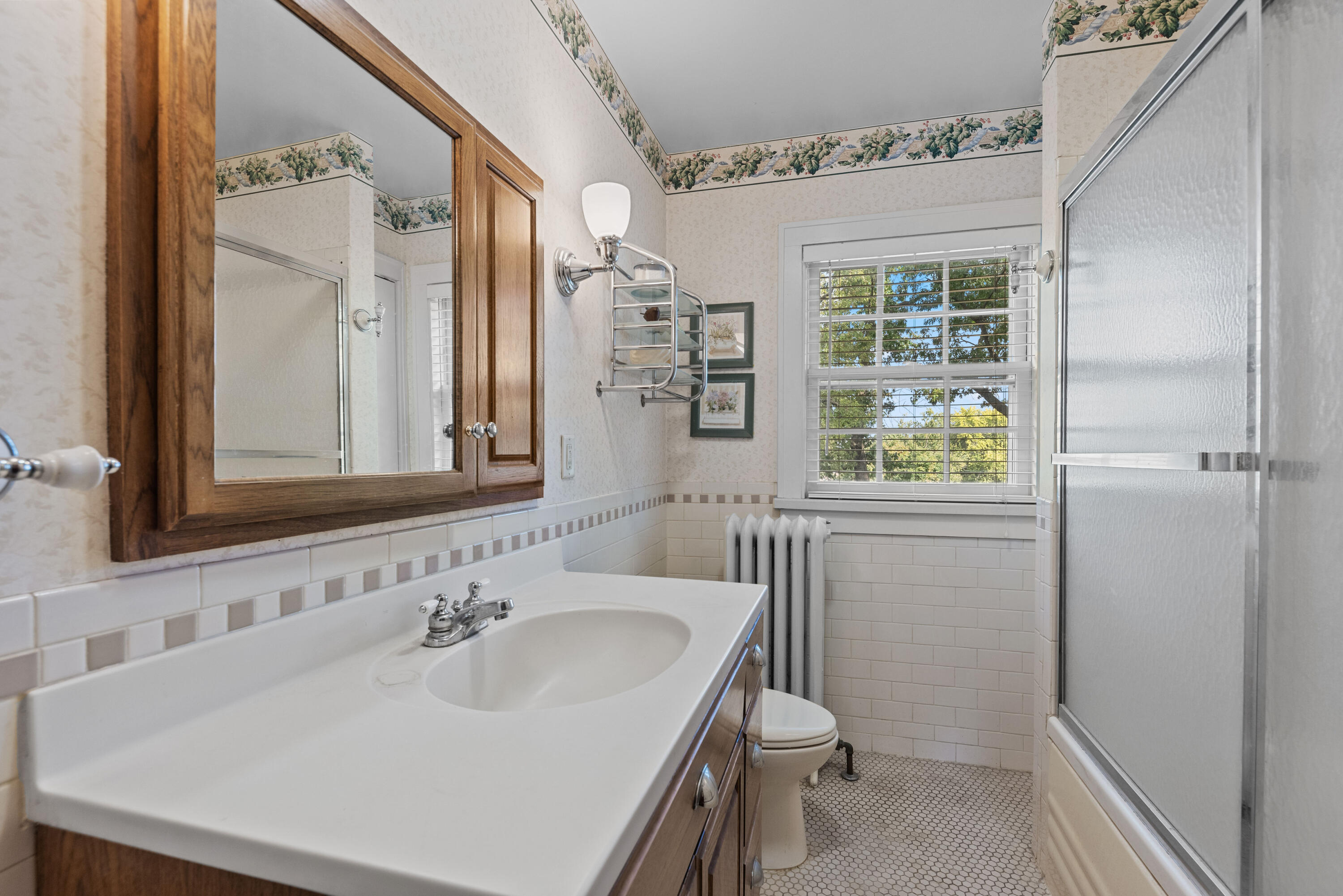 1908 Ridge Road Munster, IN 46321 - Photo 23 of 39 a bathroom with a sink toilet and shower