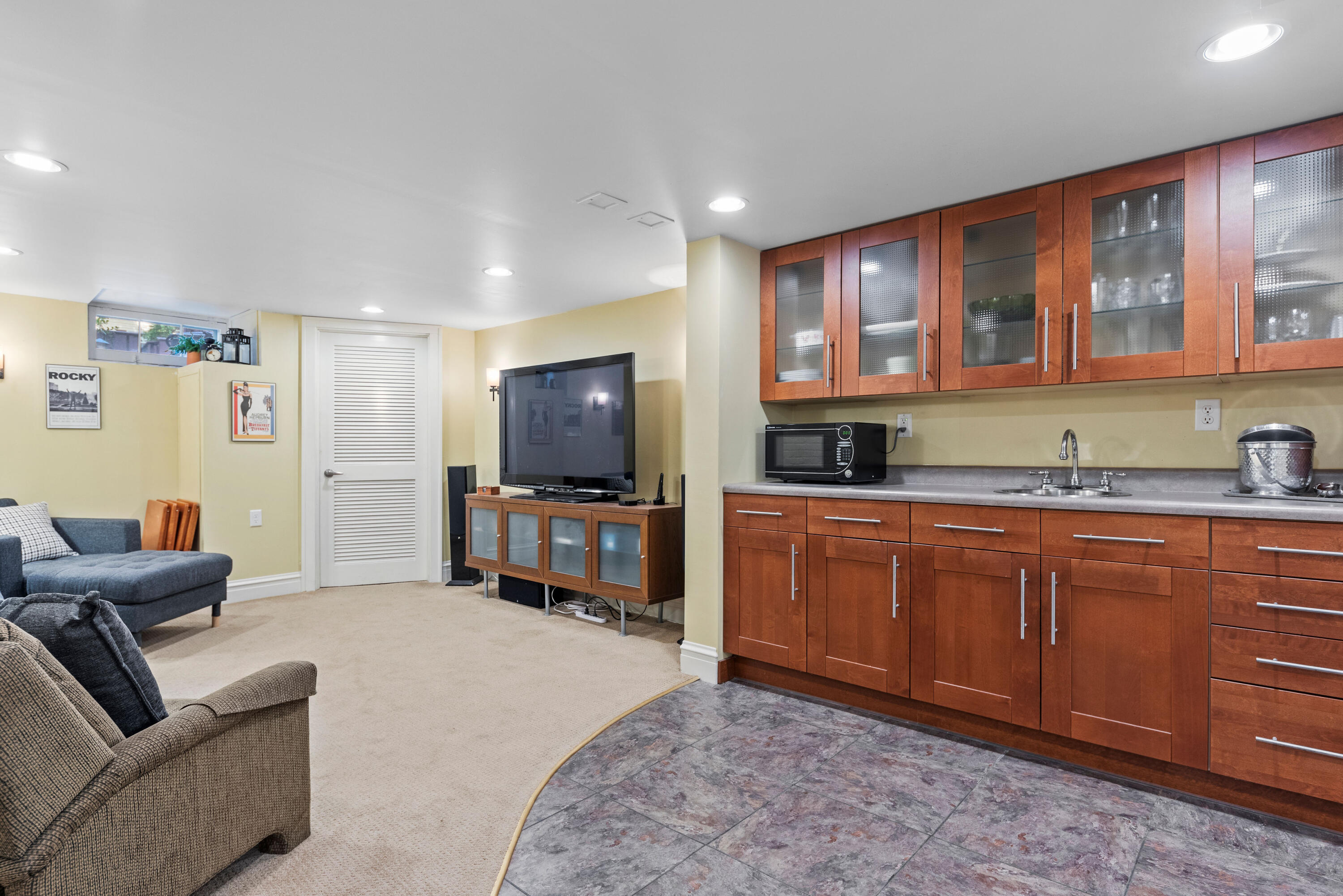 1908 Ridge Road Munster, IN 46321 - Photo 27 of 39 a living room with granite countertop furniture and a flat screen tv
