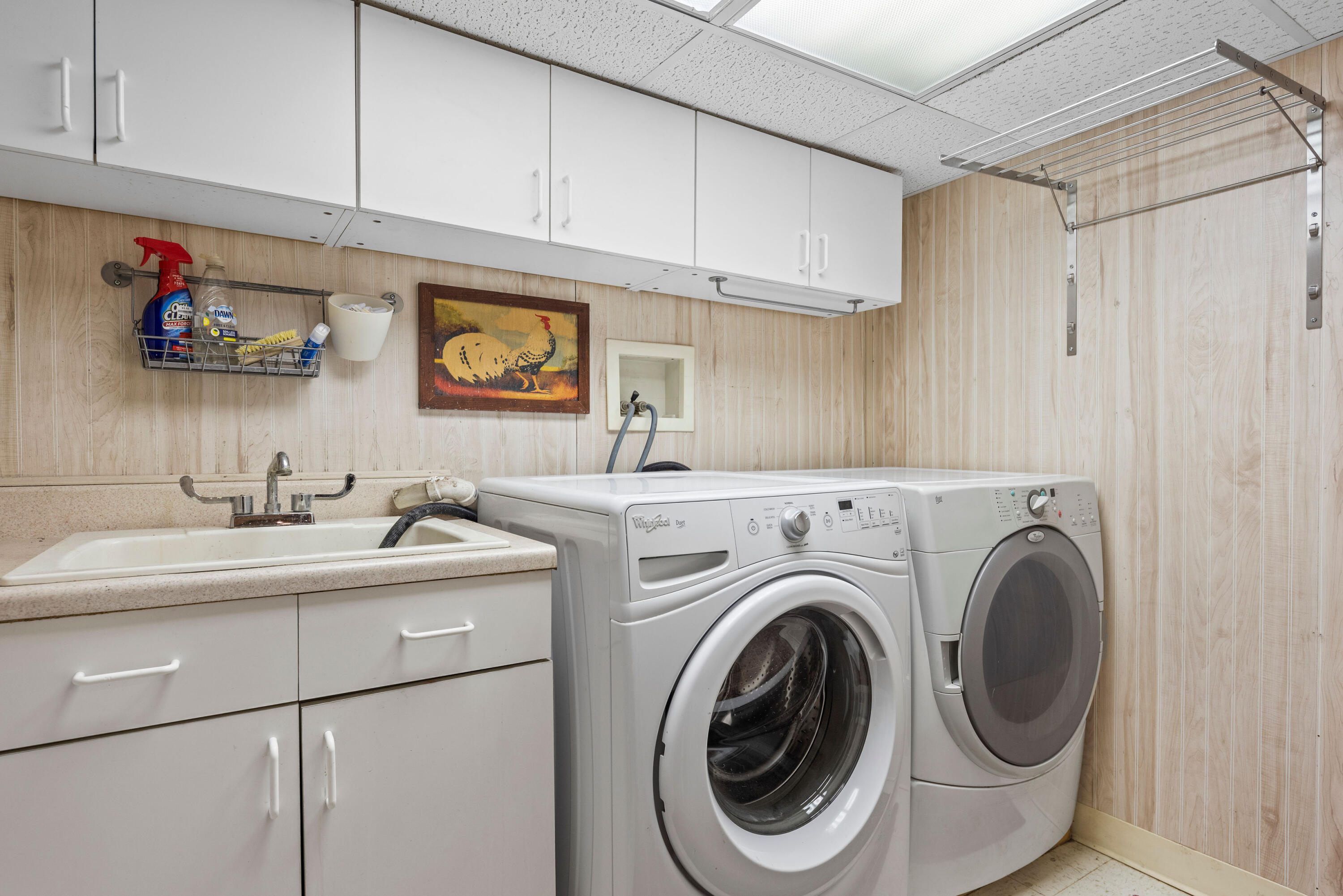 1908 Ridge Road Munster, IN 46321 - Photo 29 of 39 a bathroom with a sink a washer and dryer