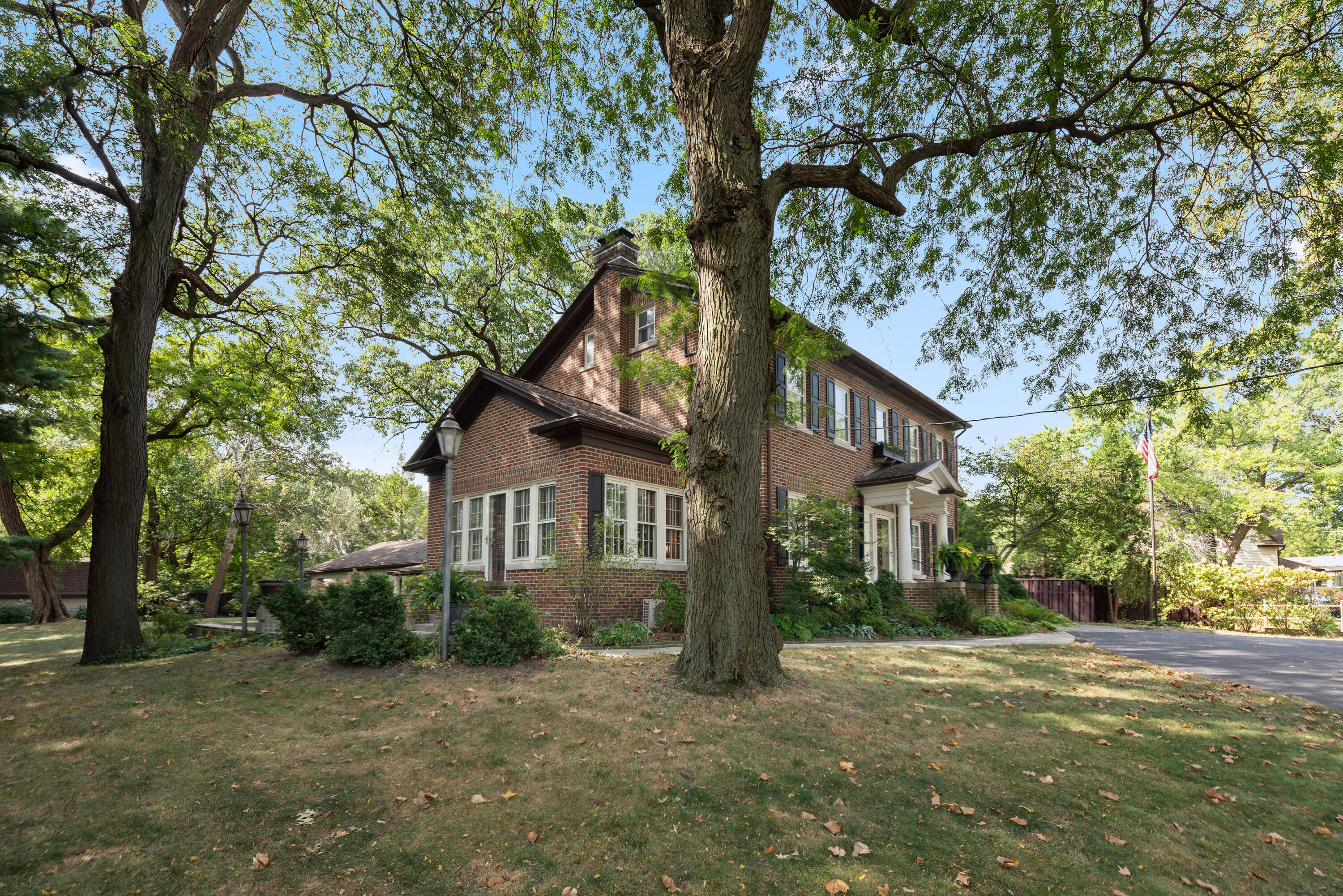 1908 Ridge Road Munster, IN 46321 - Photo 3 of 39 a house that has a tree in front of it
