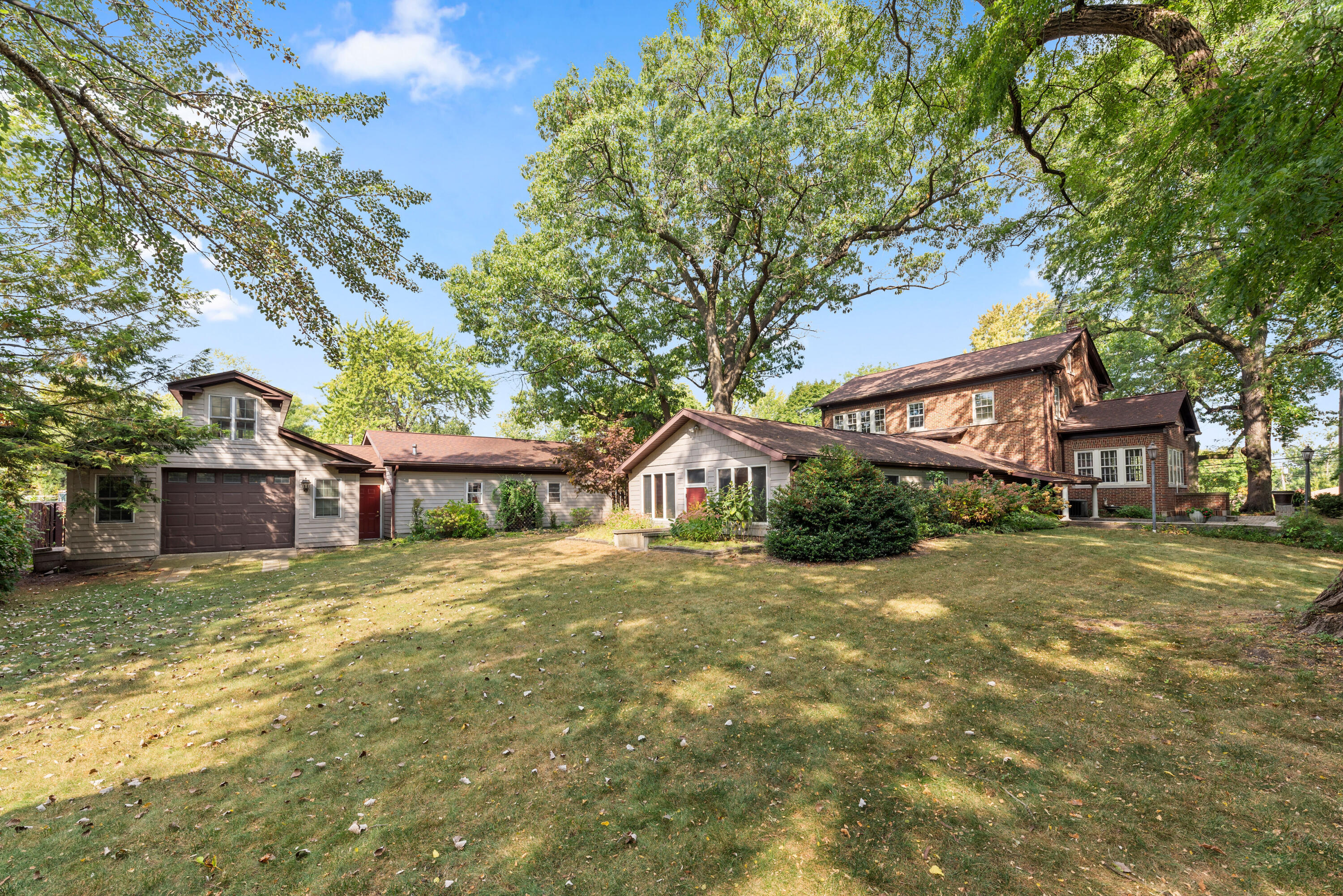 1908 Ridge Road Munster, IN 46321 - Photo 32 of 39 a view of a yard in front of a house with large trees