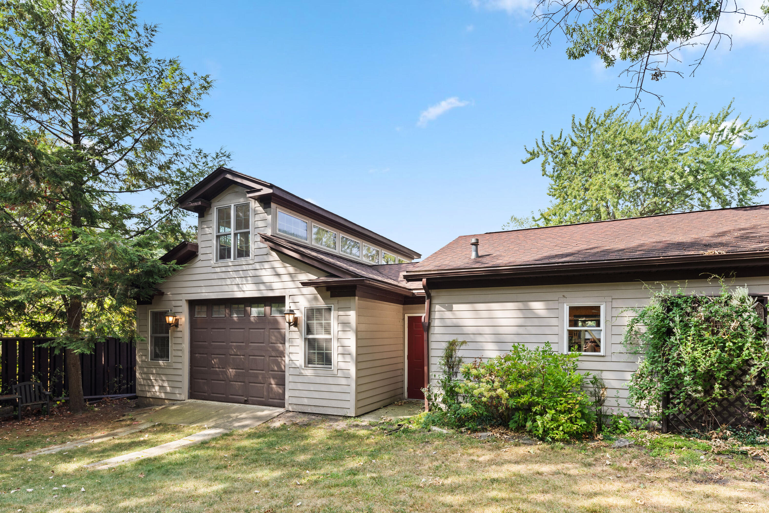 1908 Ridge Road Munster, IN 46321 - Photo 37 of 39 a view of a house with a large window and potted plants