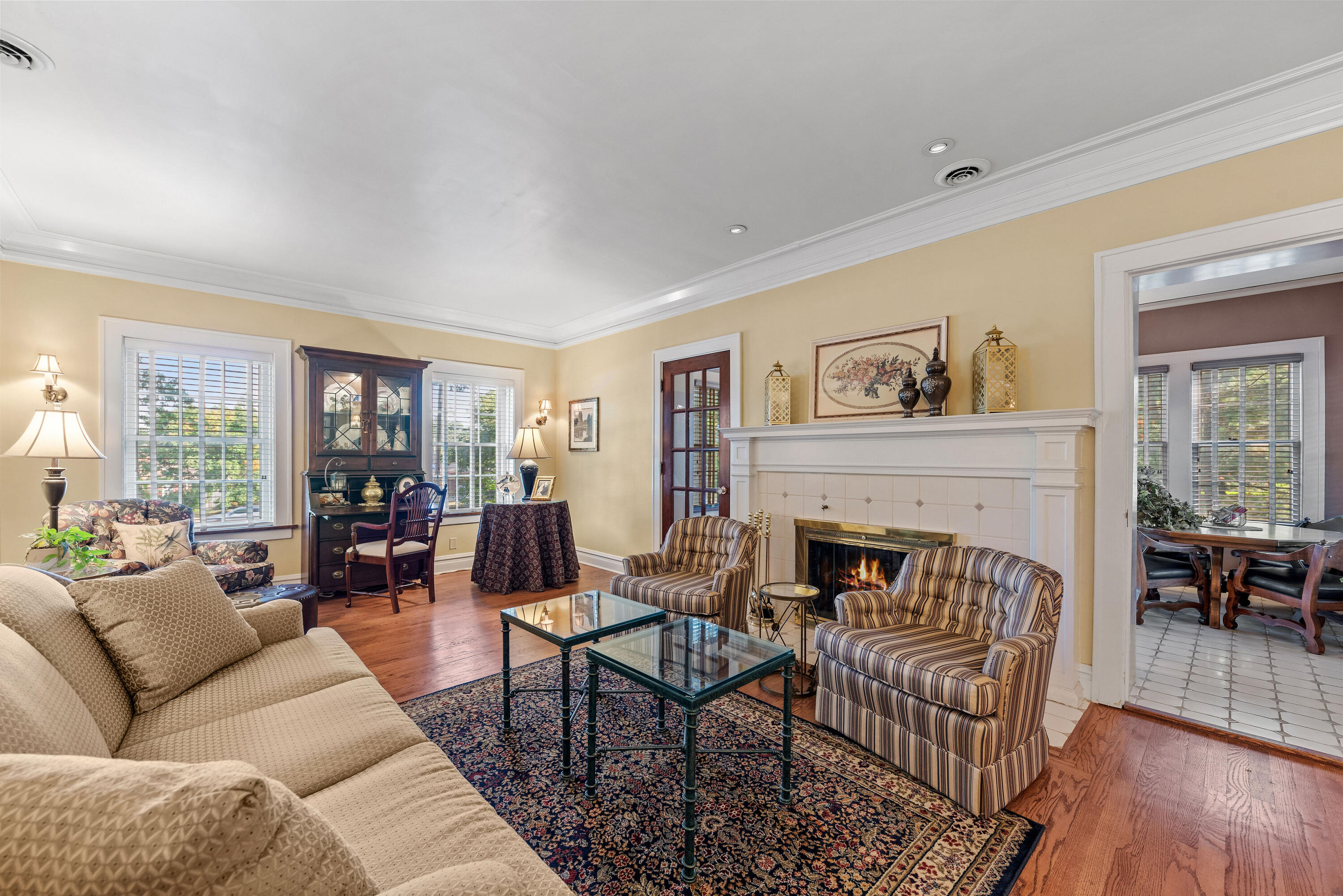 1908 Ridge Road Munster, IN 46321 - Photo 10 of 39 a living room with furniture and a fireplace