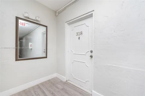 a view of a wrought iron fences in front of house