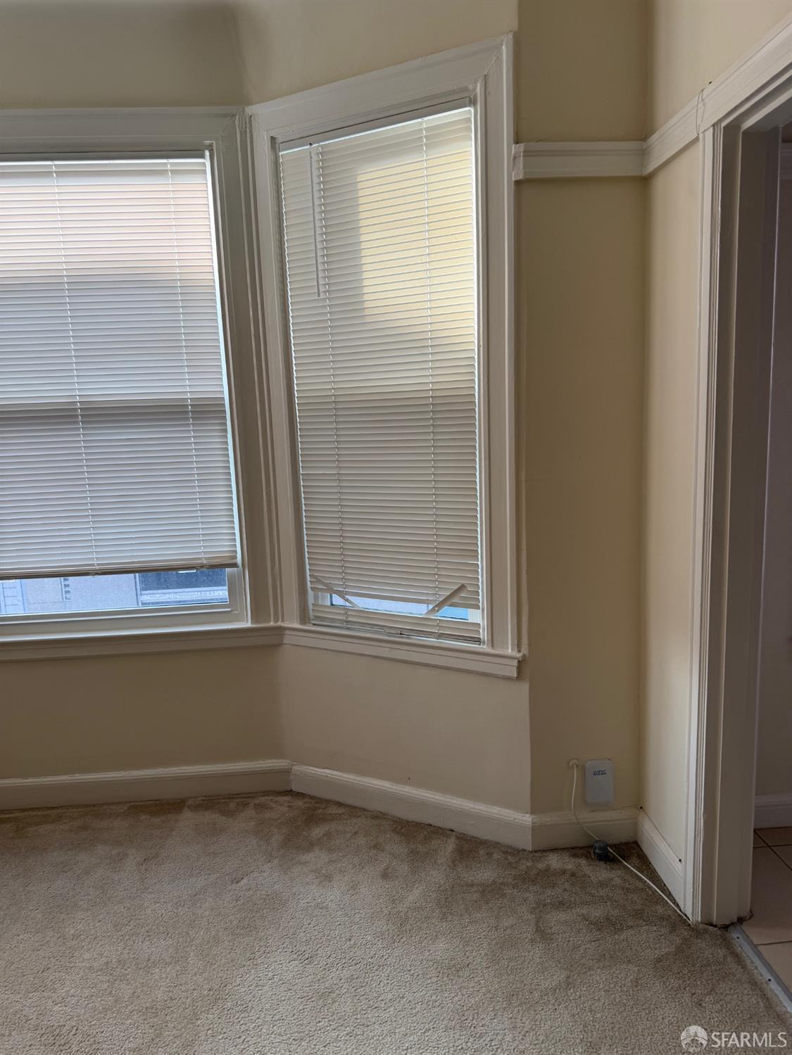 2345 Post Street, Unit 38 San Francisco, CA 94115 - Photo 2 of 5 an empty room with window