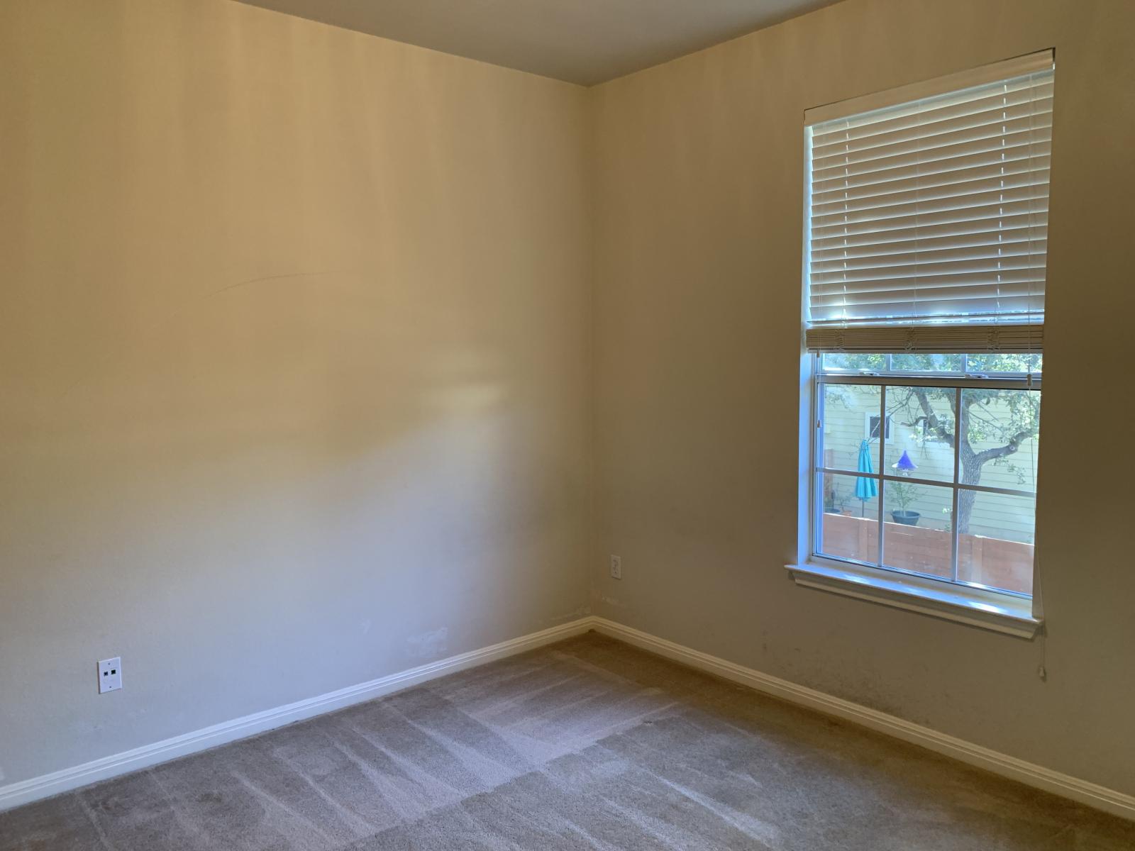 11000 Anderson Mill Road, Unit 29 Austin, TX 78750 - Photo 14 of 27 an empty room with windows