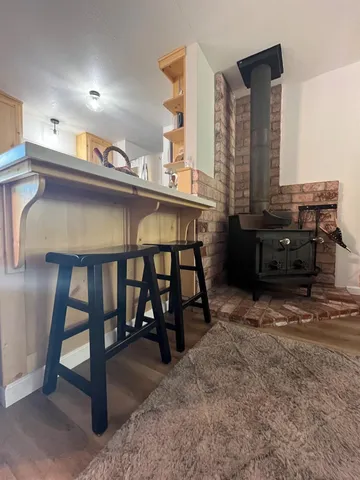 a dinning table and chairs in a room
