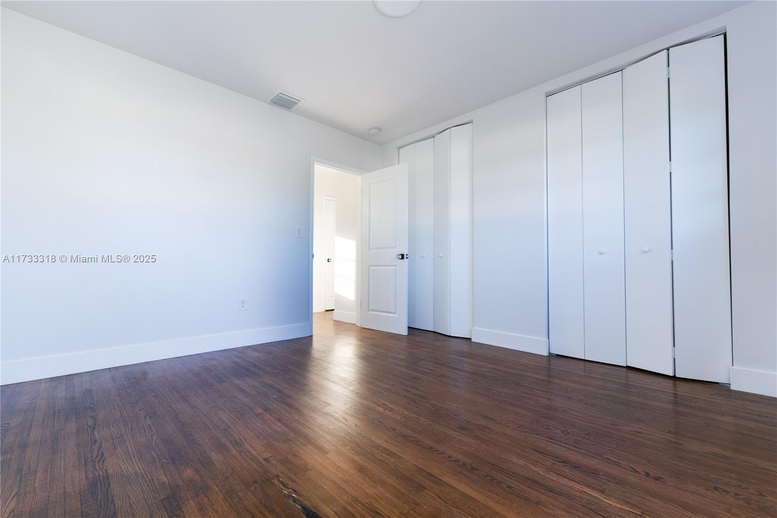 Westchester Miami, FL 33155 - Photo 15 of 17 a view of an empty room with wooden floor