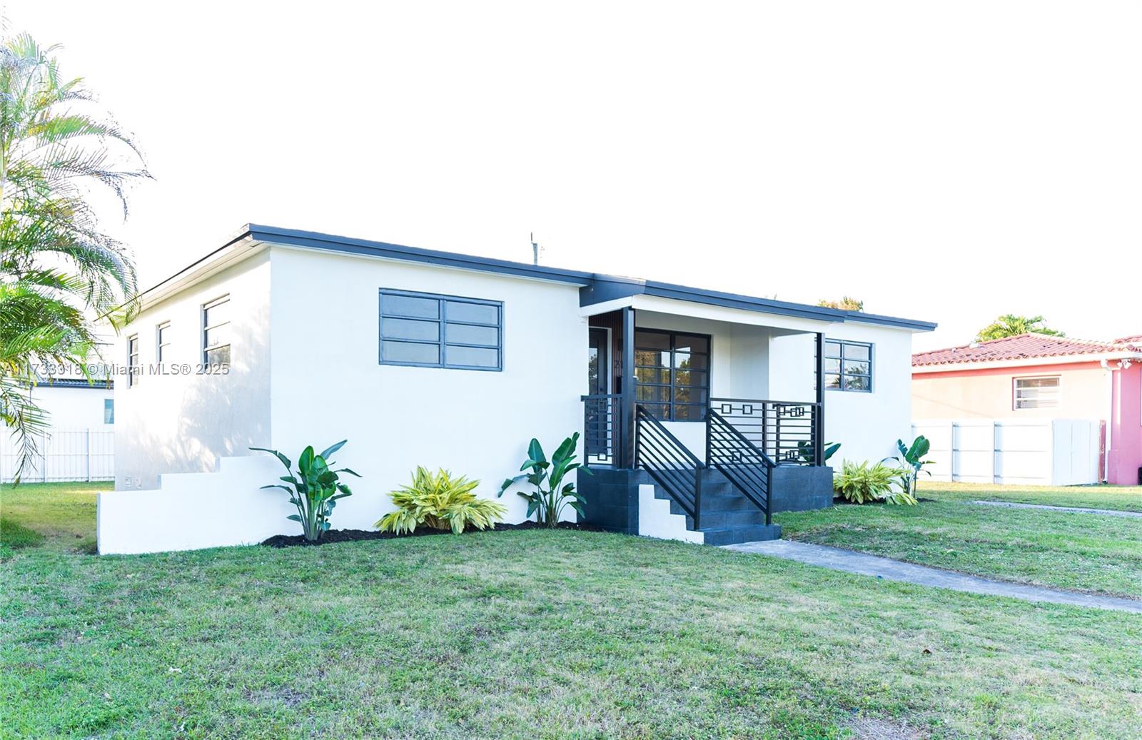 Westchester Miami, FL 33155 - Photo 8 of 17 a house view with a garden space