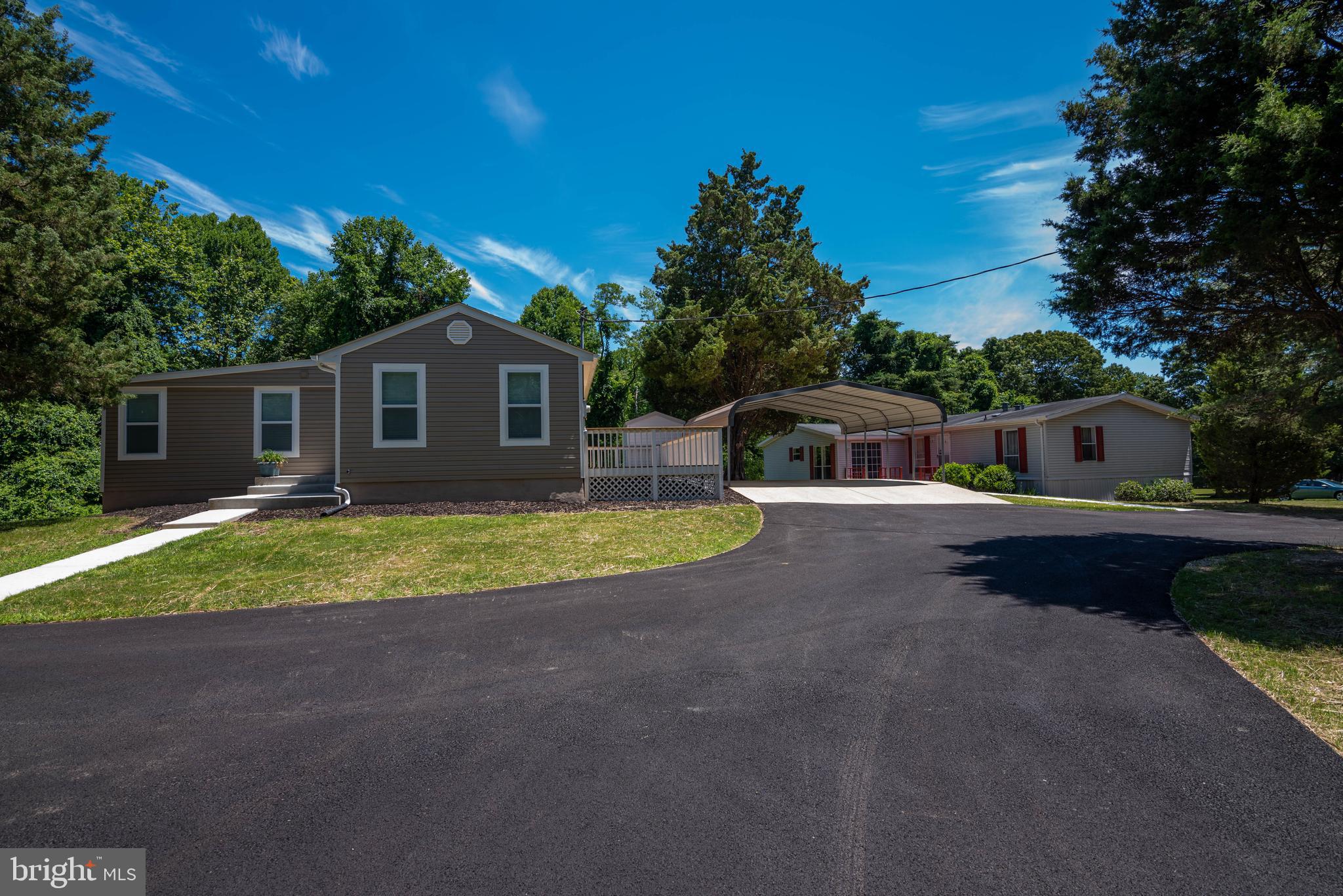 1221 Ball Road Port Republic, MD 20676 - Photo 2 of 72 a view of house with outdoor space and swimming pool