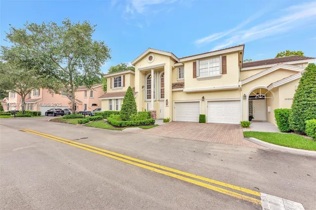 $420,000 | 12442 Northwest 10th Court, Unit C14, Coral Springs, FL 33071