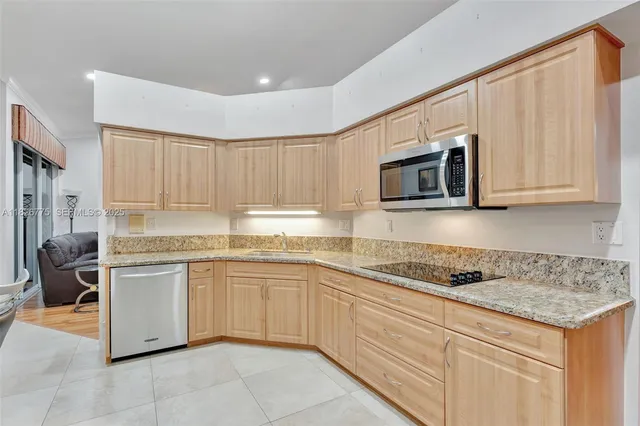 $420,000 | 12442 Northwest 10th Court, Unit C14, Coral Springs, FL 33071