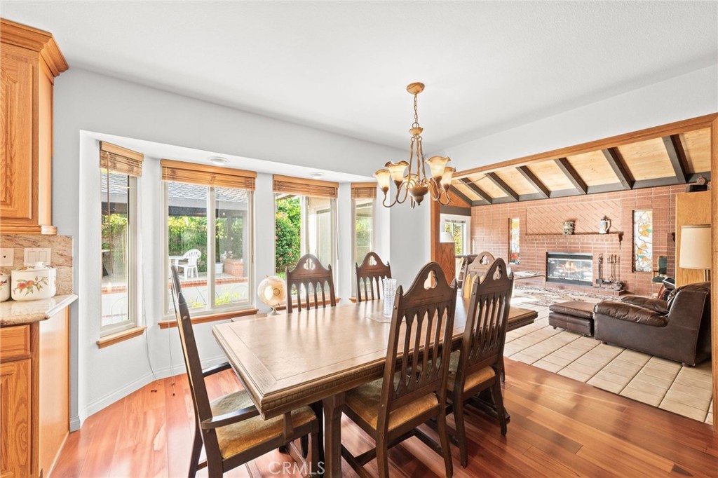 12911 Dean Street Santa Ana, CA 92705 - Photo 11 of 45 a view of a dining room with furniture large window and outside view