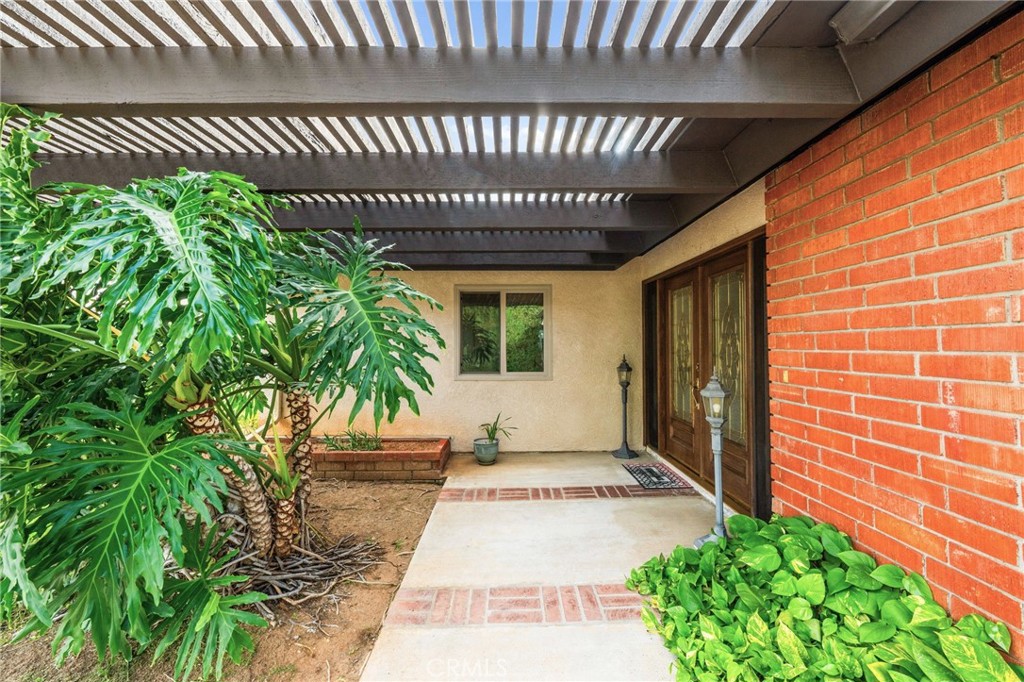 12911 Dean Street Santa Ana, CA 92705 - Photo 6 of 45 a front view of a house with a garden