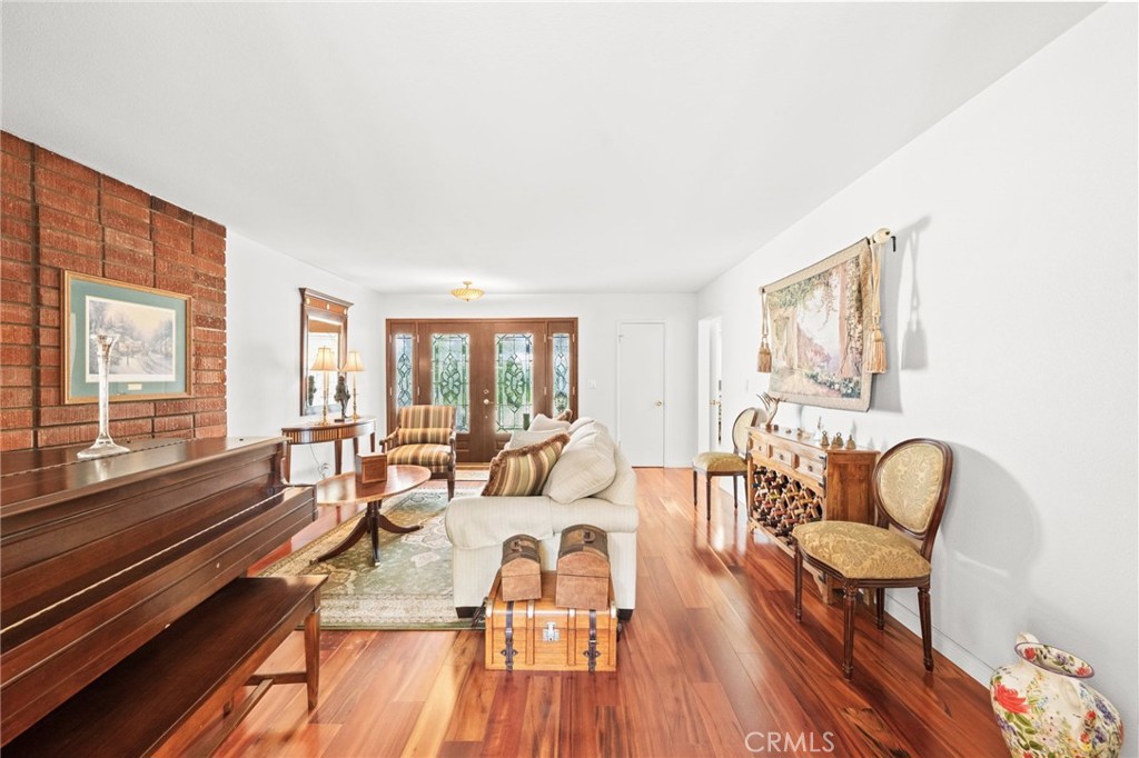 12911 Dean Street Santa Ana, CA 92705 - Photo 10 of 45 a living room with furniture and a wooden floor