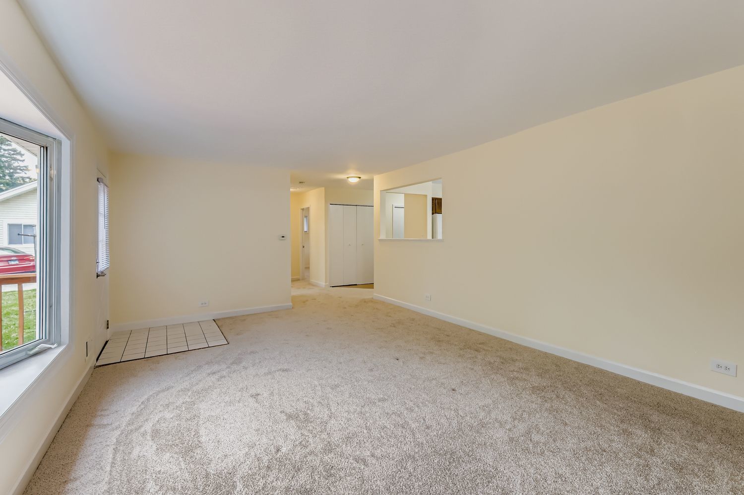 115 West Helen Road Palatine, IL 60067 - Photo 9 of 19 a view of an empty room with a window