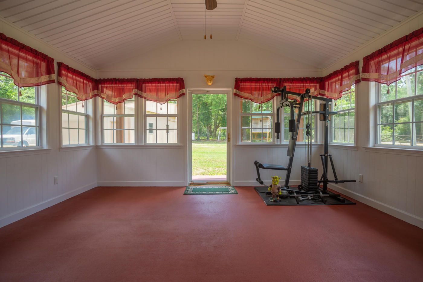 5621 Buckward Road Baker, FL 32531 - Photo 15 of 41 a view of a room with furniture and windows