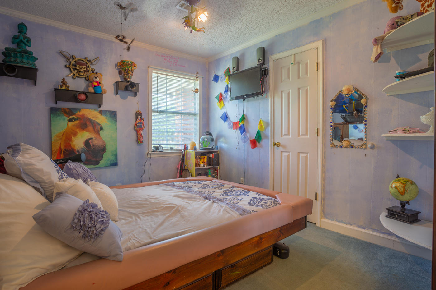 5621 Buckward Road Baker, FL 32531 - Photo 20 of 41 a bedroom with a bed and a window