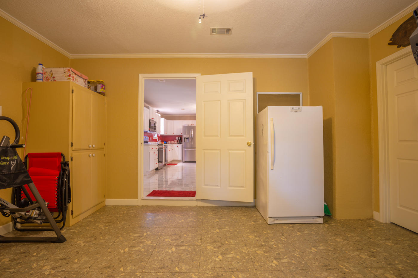 5621 Buckward Road Baker, FL 32531 - Photo 26 of 41 a view of a room with gym equipment